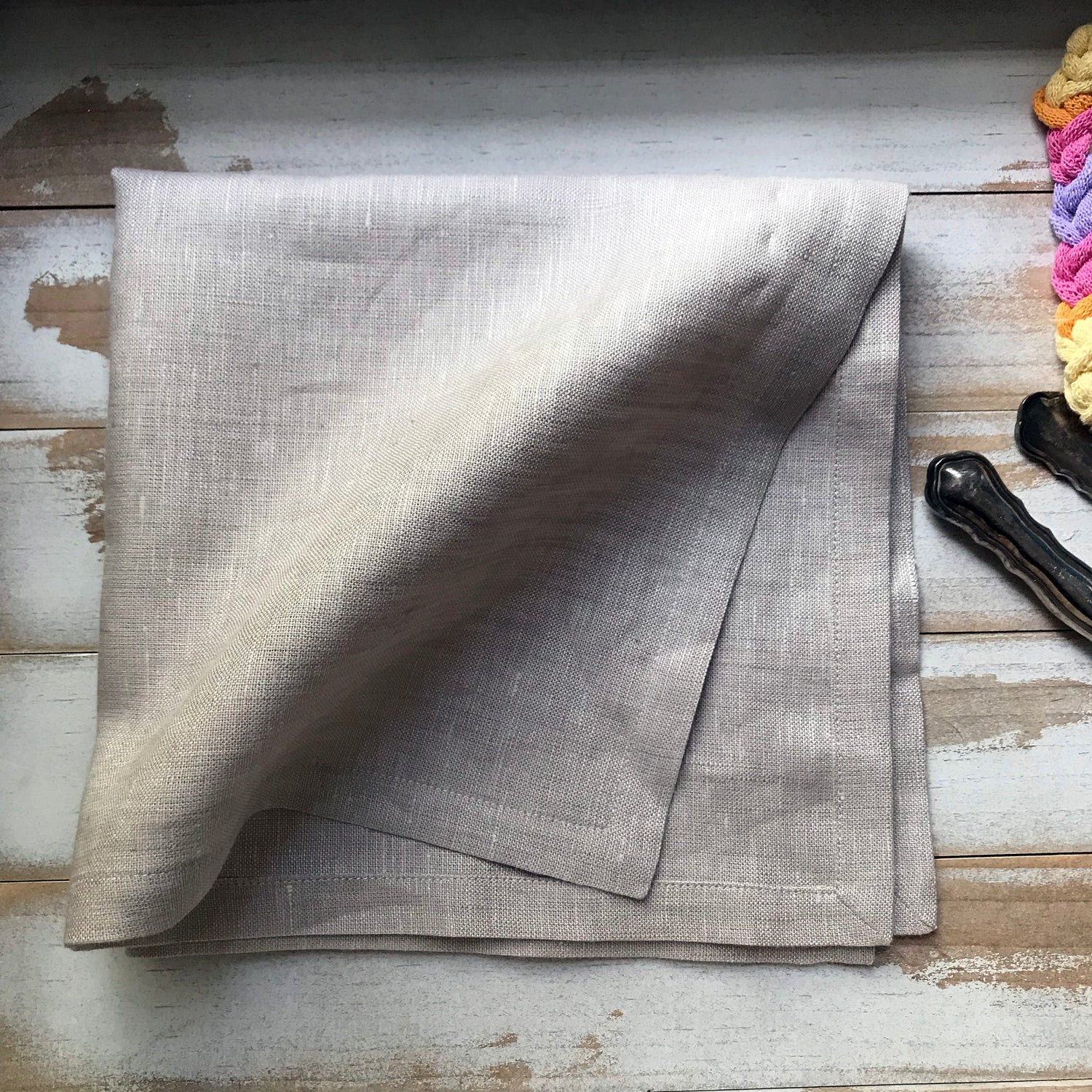 Natural linen napkins with mitered corners